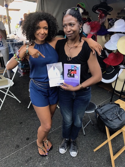 Author Crystal Black creek Carlisle 7 Former Ray Charles AAha girl, actress, Shiela pose with 2two of Crystal's books at the Central Jazz Festival in LA